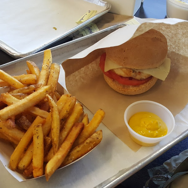 GF grilled chicken burger with fries from a dedicated fryer