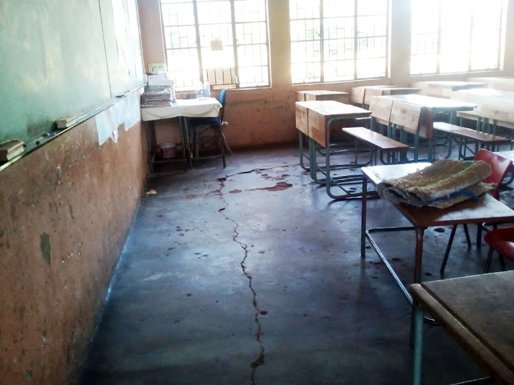 Cracked floors and walls in classes at Magubha primary school, Mpumalanga.