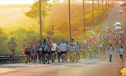 LONG WINDING ROAD: Runners take off from the HIghgate Hotel at the start of the 21km Sole Destroyer race last year Picture: ALAN EASON