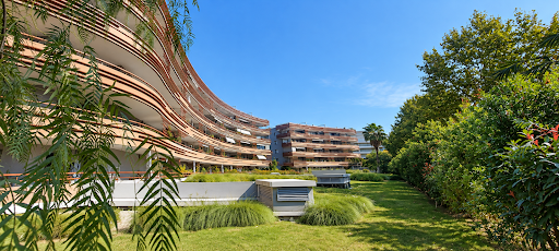 Luxury apartment / penthouse for sale in Frejus (83600) - Neighborhood Fréjus Plage - Modern buildings with balconies and green garden