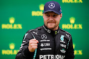 Race winner Valtteri Bottas celebrates in parc ferme during the F1 Grand Prix of Turkey at Intercity Istanbul Park on October 10, 2021 in Istanbul, Turkey.