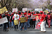 Cosatu members march through the Pretoria CBD during the trade unions day of national action. 