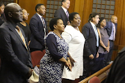 The accused in the Nulane Investment fraud and money-laundering case, from left, Peter Thabethe, Limakatso Moorosi, Seipati Dhlamini, Iqbal Sharma, Ronica Ragavan and Dinesh Patel. File photo.