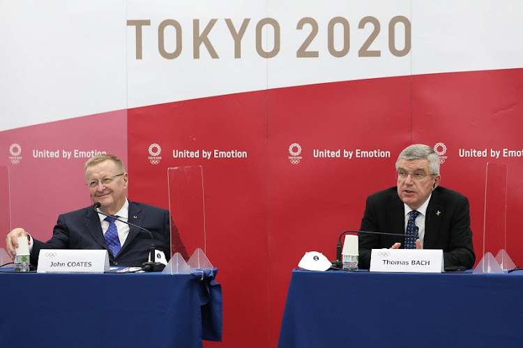 International Olympic Committee (IOC) President Thomas Bach (R) and chairman of the Tokyo 2020 Olympic Games coordination committee John Coates (L) attend a joint press conference between the IOC and Tokyo 2020 on November 16, 2020 in Tokyo, Japan. Mr Bach is making a three-day visit to Tokyo to discuss the 2020 Olympic and Paralympic Games that were postponed because of the Covid-19 coronavirus pandemic.