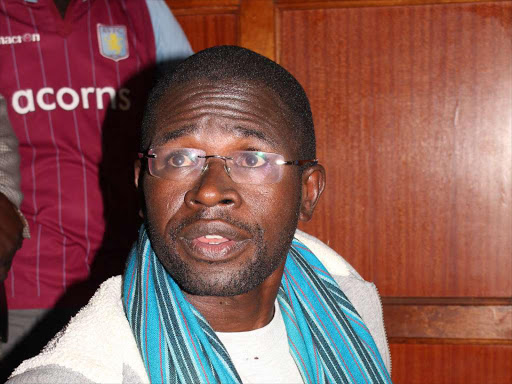 Nation journalist Walter Menya at a Milimani law court on Monday,June 19 when he was presented to the court. PHOTO/COLLINS KWEYU