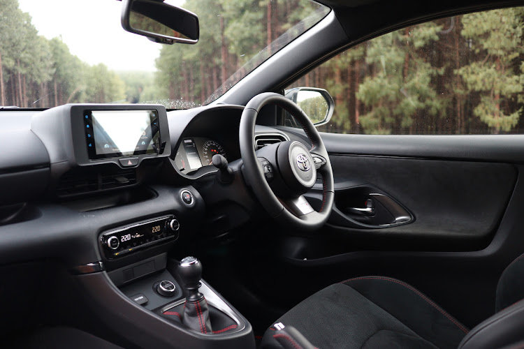 The interior is surprisingly comfortable and well equipped for a homologation special.