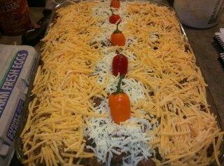Party Size Meat,Bean & Cheese Dip ready to go into the oven.