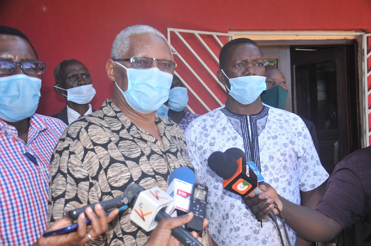 The President Kenya National Congress of Pentecostal Churches and Ministries Bishop Stanley Michuki with other members address the press at Praise Chapel Church in Mombasa.