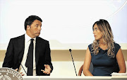 RULES OF ATTRACTION: Italy's Prime Minister Matteo Renzi with the Minister for Constitutional Reforms and Parliamentary Relations, Maria Elena Boschi, in Rome