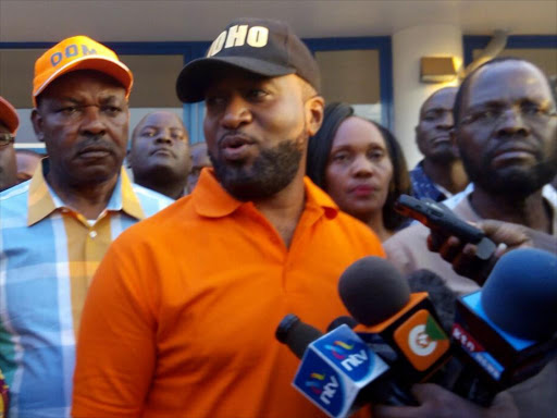 ODM deputy party leader Hassan Joho together with Kisumu Governor Jack Ranguma and Senator Anyang' Nyong'o upon his arrival at Kisumu International Airport on September 30, 2016, /FAITH MATETE