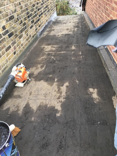 Flat Roof has been cleared of moss and debris 