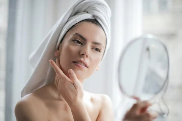 selective-focus-portrait-photo-of-woman-with-a-towel-on-head