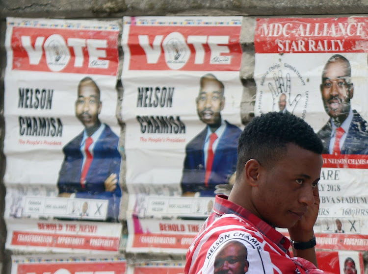 A Zimbabwe opposition party supporter gestures as he attends an MDC rally at Sakubva stadium in Mutare, Zimbabwe, on July 14,2018. File photo: REUTERS/PHILIMON BULAWAYO