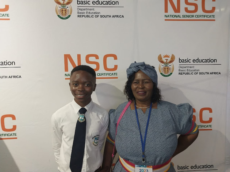 Bhekumuzi Mnisi with his mother, Maria Masemola, at the ministerial breakfast for top achievers.