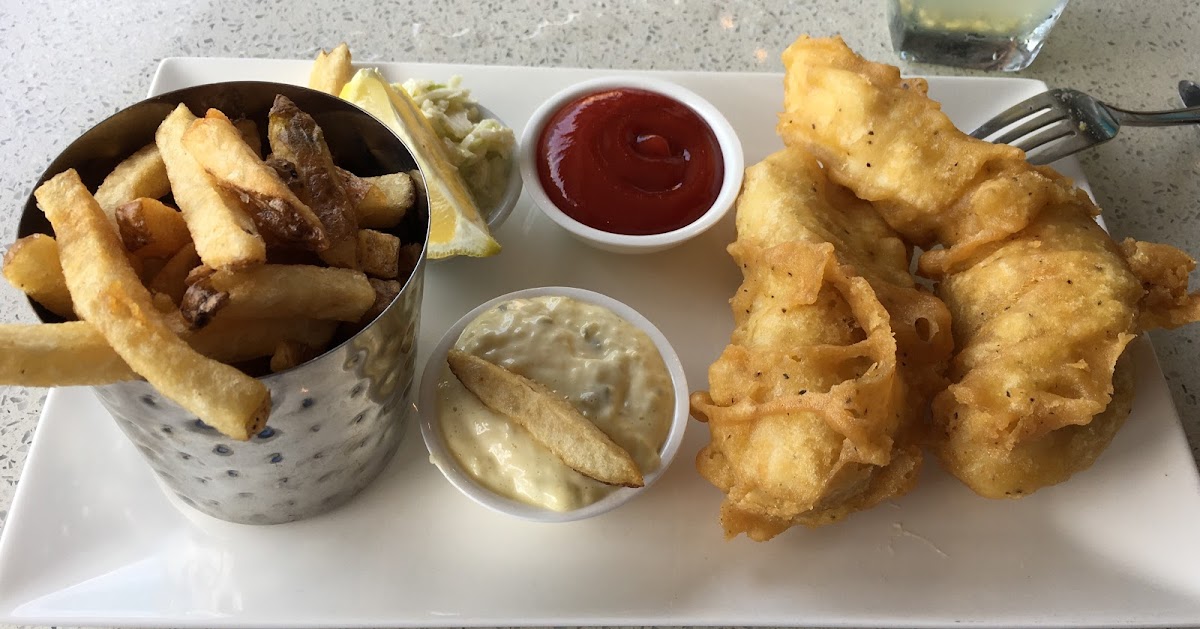 Gluten free Fish and Chips (2 pieces) with Cole Slaw and Tarter Sauce.