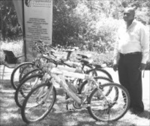 GOOD SAMARITAN: Bruce Kgapane with bicycles he gave to poor pupils in Nelspruit, Mpumalanga. Pic. Andrew Hlongwane. © Sowetan.