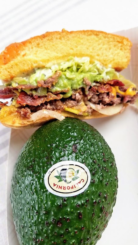 Avocado Month Specials at Pine Street Market for June 2018: for all of June only, Bless Your Heart Burgers is putting together a special version of the cheeseburger stacked with North West Natural Beef, Bacon, California avocado on the Martin’s potato roll, with Duke’s mayonnaise, shredded lettuce, sweet onions, homemade pickles and house made ranch