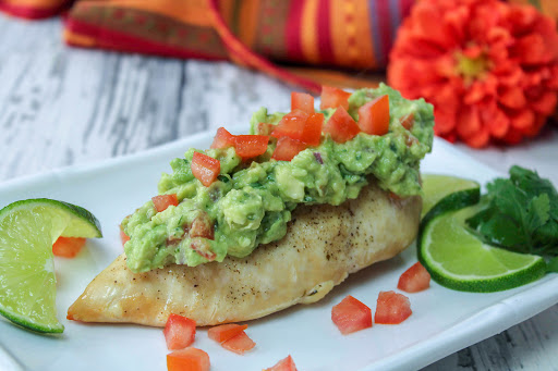 Cilantro Guacamole Chicken on a plate.