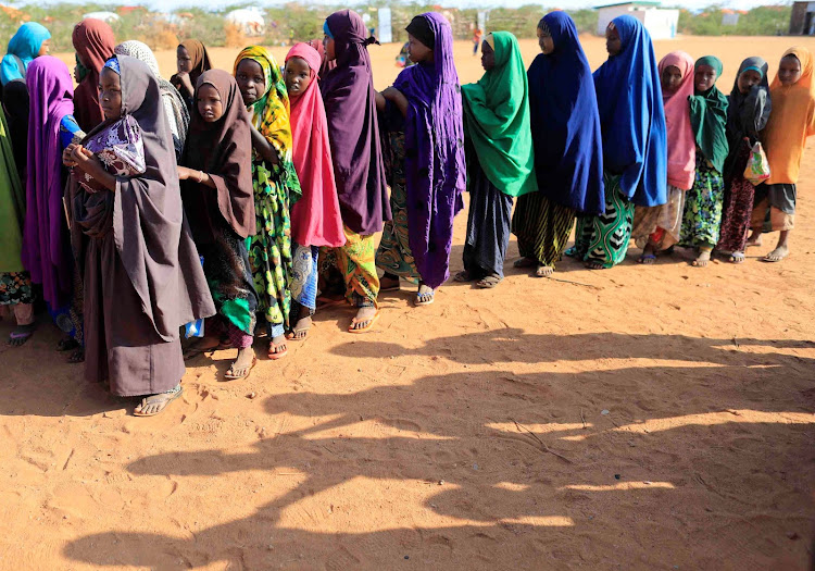 Women and girls all over Africa are being affected by the Covid-19 global lockdown and are at higher risk of abuse from genital mutilation. Internally displaced girls in Somalia queue at a school in Dollow, Somalia,. Many Somali girls are home from school because of the lockdown.