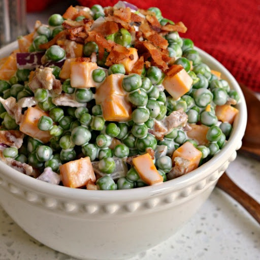 This delectable creamy pea salad comes together in less than ten minutes and is a favorite at family reunions, potlucks and picnics.