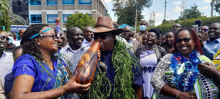 Phillip Kirwa celebrates with staff at Moi Teaching and Referral Hospital on May 18, 2024