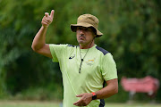 SA Sevens coach Neil Powell puts his charges through their paces during training.
