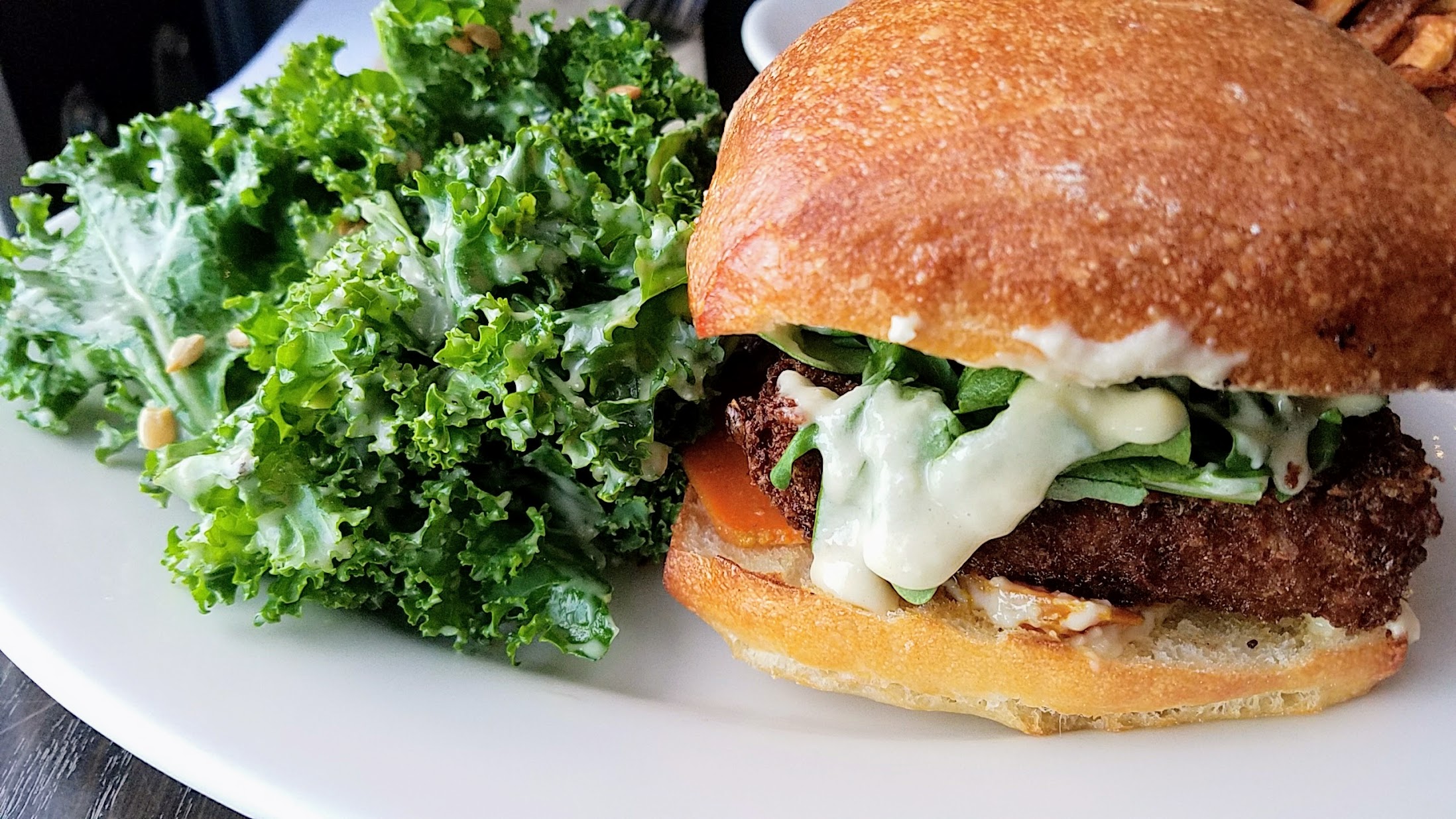 Ecliptic Brewery's vegetarian/vegan option to their burgers - this Farro Burger with a wheat-garlic patty, tahini, arugula, spicy pickled carrots