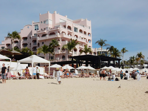 Visitors from around the world descend on Cabo San Lucas, Mexico, for its warm sand and carefree social scene. 