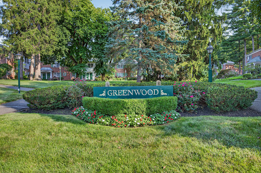 Luxury property for sale in Pleasantville (United States) - Greenwood sign surrounded by greenery