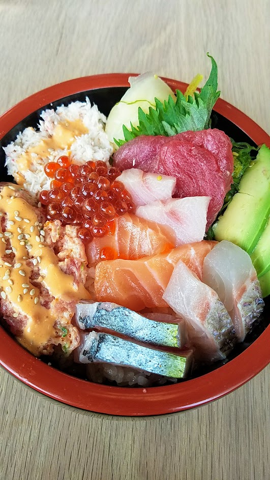 Chirashi Bowl from Afuri with big eye tuna, yellowtail, striped jack, salmon, sea bream, salmon roe, spicy tuna, California crab, avocado, seaweed, and pickled ginger