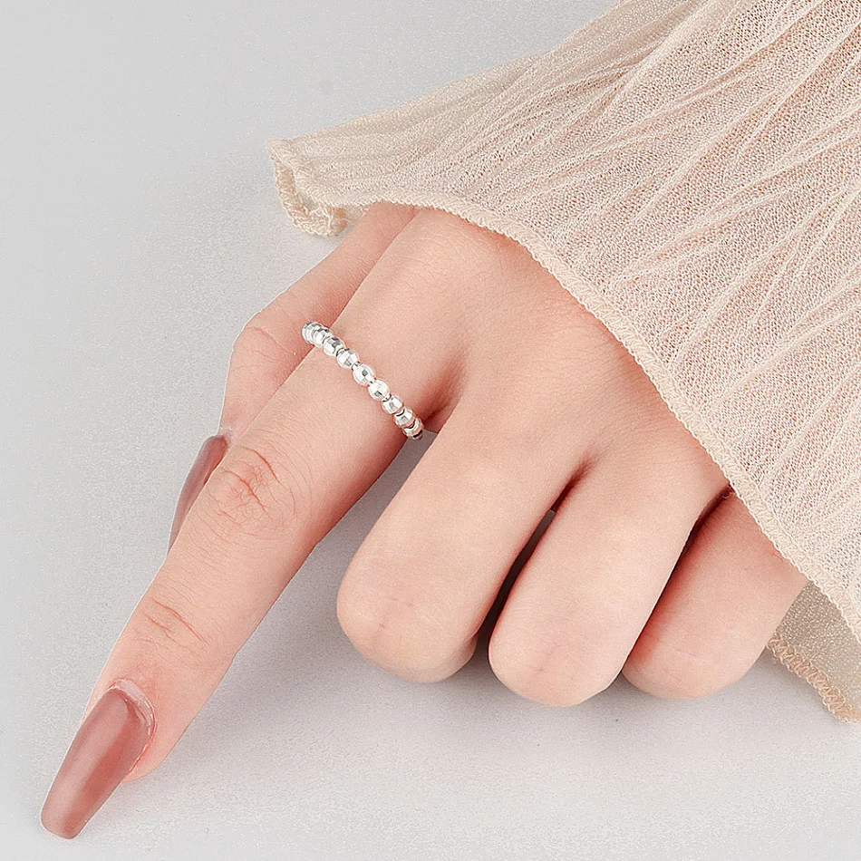 Anillo de moda para mujer con cuentas móviles un accesorio elegante y versátil para cualquier ocasión, ajustable y fácil de combinar.