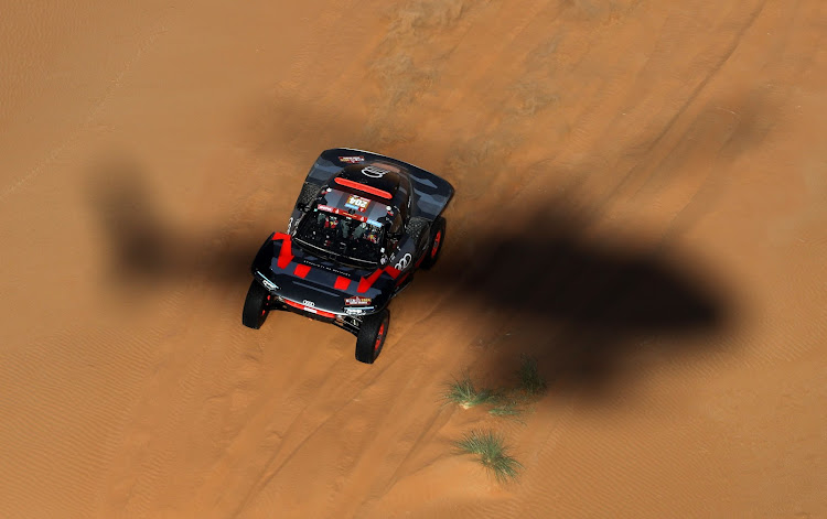 Audi's Carlos Sainz and co-driver Lucas Cruz in action during stage 6.