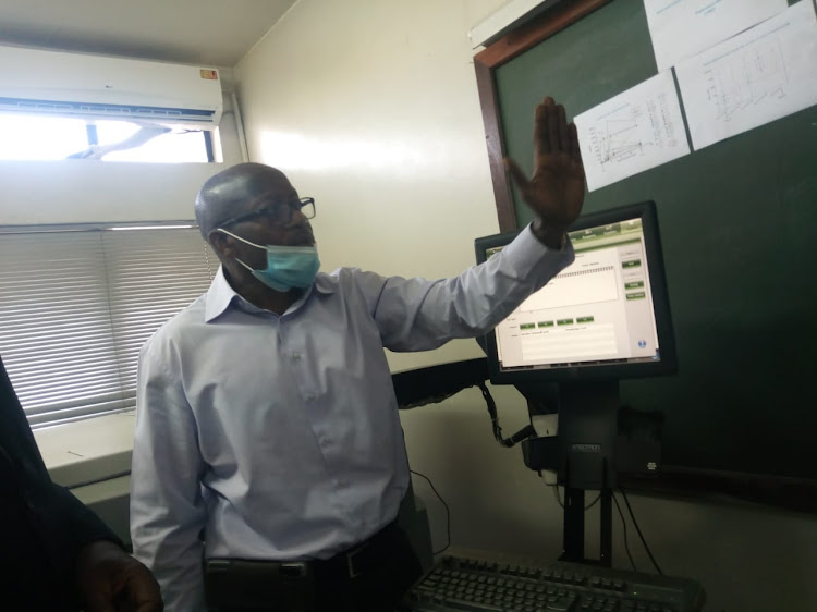 Senior virologist Prof Omu Anzala explains how data from genomic sequencing is attained, at the KAVI institute of Clinical Research on June 2, 2021