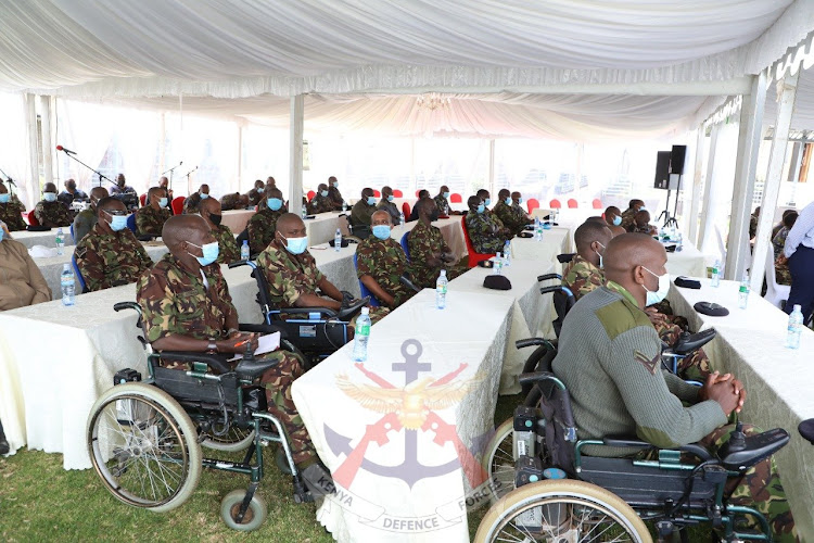 The soldiers listening in during the training.