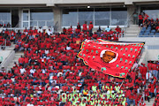 A flag depicting EFF leader Julius Malema being hoisted by supporters at the party's manifesto launch at Giant Stadium in Soshanguve, Tshwane.