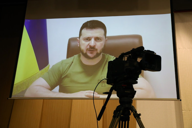 Ukrainian President Volodymyr Zelensky addresses the South Korean parliament via video link at the National Assembly on April 11, 2022 in Seoul, South Korea. Zelensky has made a number of virtual appearances in recent weeks, lobbying foreign governments to help Ukraine defend itself against Russia's invasion.