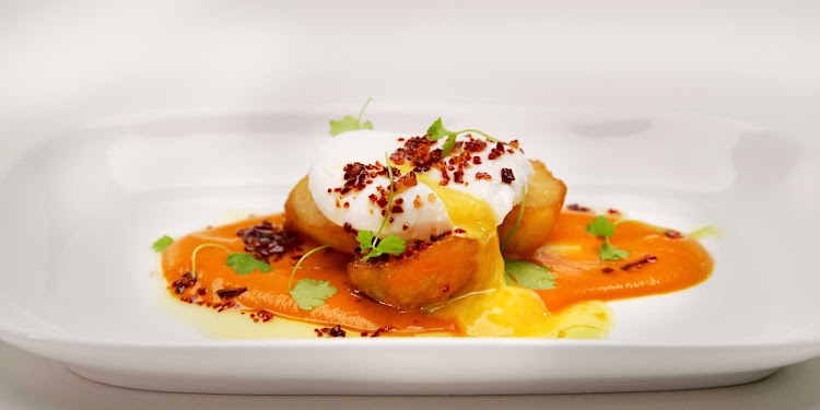 A poached egg prepared at Blu, a specialty restaurant on Celebrity Edge. 