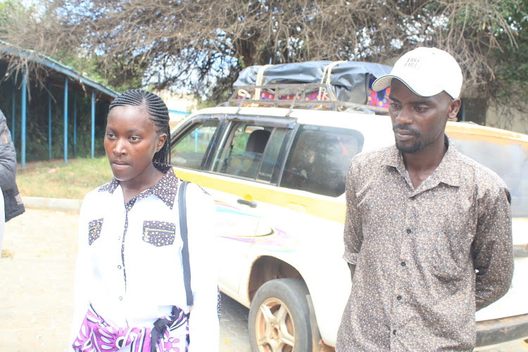 Mrs. Mwaniki and her husband, Mwaniki Mwanzia at Mwingi level 4 hospital mortuary after the collected body of their second born son on Tuesday morning.