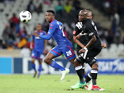 SuperSport United midfielder Teboho Mokoena vies for the with Musa Nyatama of Orlando Pirates during the Absa Premiership 2017/18 match at Mbombela Stadium, Johannesburg on 11 April 2018. The match ended 0 - 0. 