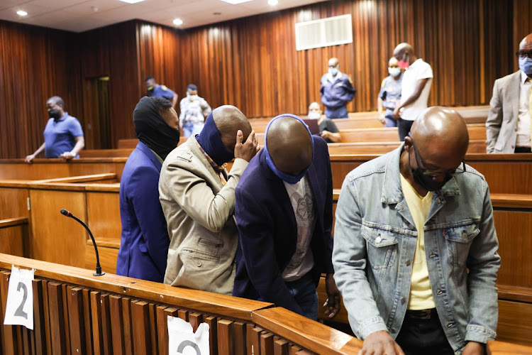 Police officers, from left, Tshepiso Kekana, Cidraas Motseothatha, Madimetja Legodi and Victor Mohammed, are accused of murdering Mthokozisi Ntumba, who died after being caught in crossfire during student protests last year.