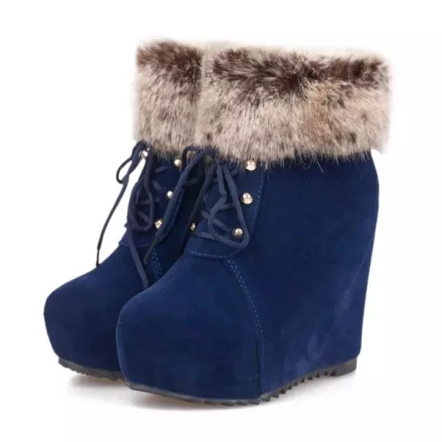 Bottines courtes femme en fourrure intérieure rehaussantes, plates, fermeture éclair latérale, confort et élégance pour l'hiver.