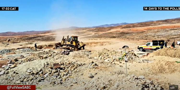 A screen shot of rescue operations underway at the Nuttaboy mine in the Northern Cape after the collapse of tunnels, which artisanal miners had dug.