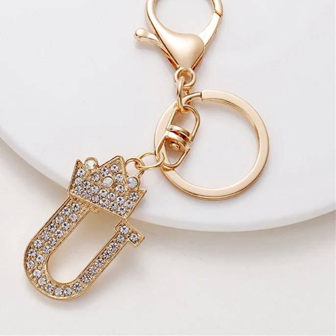 Metalen sleutelhanger met 26 Engelse alfabetletters, diamant-bezette kroon, een stijlvol accessoire voor je sleutels.