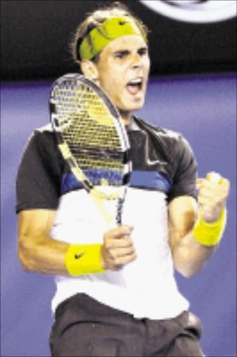 COME ON! Rafael Nadal reacts as he plays Gilles Simon during their men's singles quarterfinal match at the Australian Open in Melbourne, Australia, yesterday. 28/01/09. Pic. Rob Griffith. © AP.