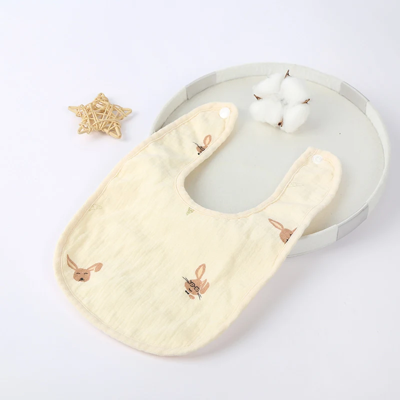 Baby slabbetje van puur katoen met fluwelen muts en speekseldoek. Beschermt en houdt uw baby schoon en droog. Comfortabel voor dagelijks gebruik.