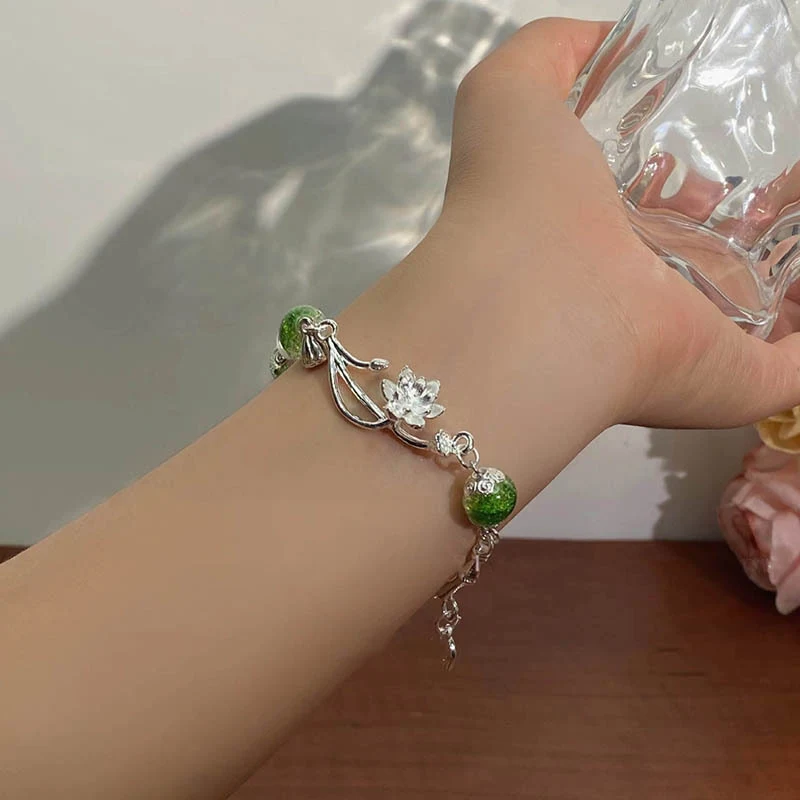 Nouveau bracelet de perles de lotus froid pour femmes, style chinois. Apportez une touche d'élégance orientale à votre tenue. Idéal pour toutes les occasions.