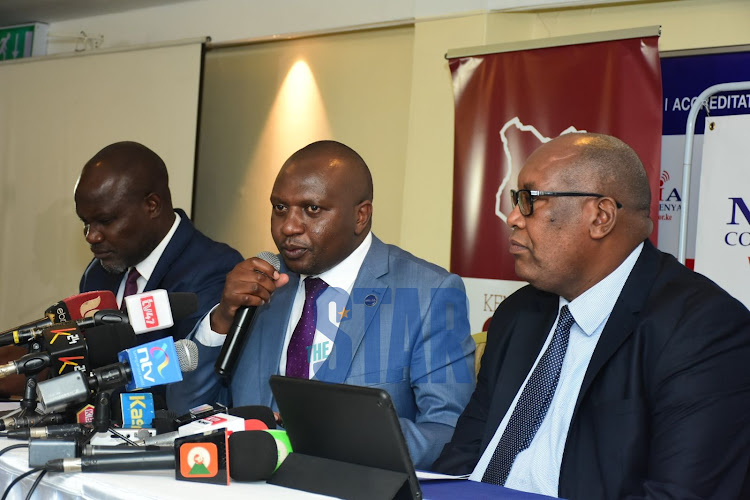 NMG CEO Stephen Gitagama on the right in black coat, MCK CEO David Omwoyo in the middle and KEG President Churchill Otieno, far left during the launch of Presidential Debate at Sarova Panafric on March 2, 2022