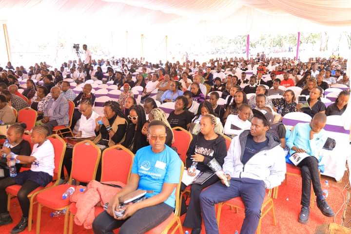 Mourners during the burial service of Joseph Mwadulo on Friday, April 12, 2024.