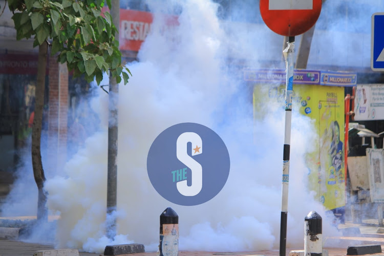 Teargas smoke fills the air in Nairobi CBD on Monday