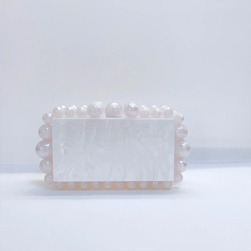 New Acrylic Cloud Bag Clutch. Stylish and modern for special events. Carry your essentials with elegance and sophisticat